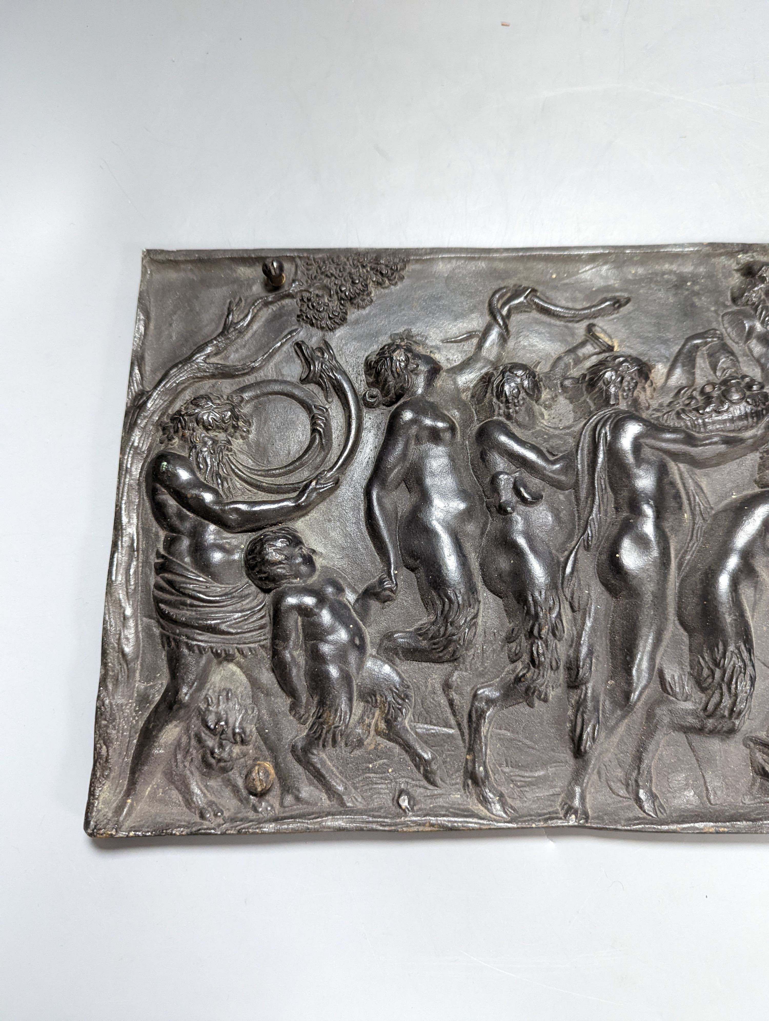 A 19th century cast bronze Bacchanalian plaque, 47 cms wide x20 high.